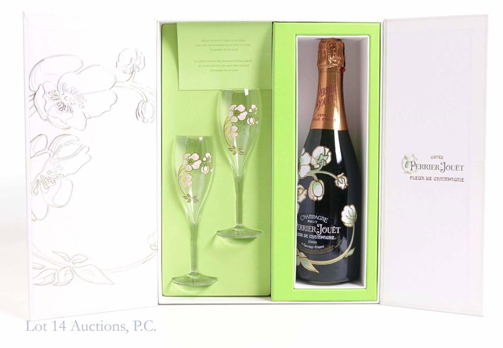 2000 Champagne Brut Perrier-Jouet: **IF YOU MAY NEED SHIPPING, PLEASE CALL US AND SPEAK WITH IAN BEFORE BIDDING ON BOTTLES. 847-625-0555.** Light dirt on box. Boxed set: 1 bottle, 2 flutes. 12.5%, 750 ml.