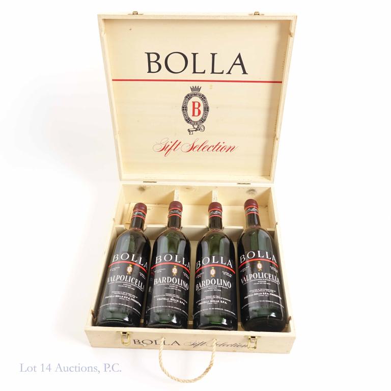 1983 / 1984 Bolla Gift Selection (4): **IF YOU MAY NEED SHIPPING ON BOTTLES PLEASE CALL US BEFORE BIDDING! 847-625-0555!** Four bottles of Bolla Bardolino (1983 and 1984): 12%, 750ml and all bottles are sealed. Inside wood carrying case. 