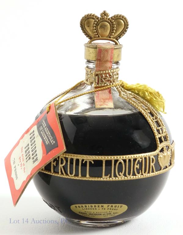 1946 Forbidden Fruit Bottle: ***IF YOU MAY NEED SHIPPING, PLEASE CALL US BEFORE BIDDING ON BOTTLES. 847-625-0555.*** With neck tag and IL tax stamp.