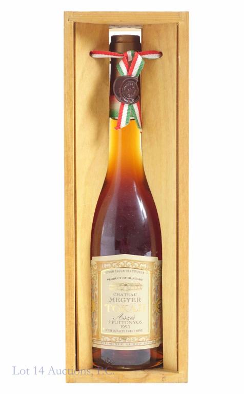 1993 Chateau Megyer Tokaji Wine - Hungary: ** IF YOU MAY NEED SHIPPING, PLEASE CALL US BEFORE BIDDING ON BOTTLES. 847-625-0555. ** 500ml sealed and full bottle, in original wood case. "High quality sweet wine."