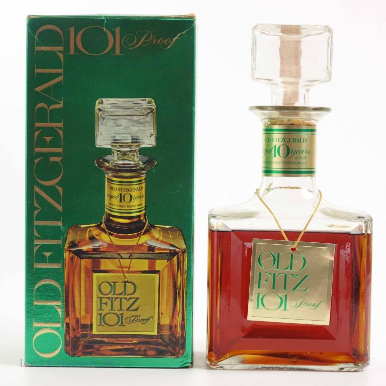 1978(?) Old Fitzgerald 101 Proof 10 Yr. Bourbon: ** IF YOU MAY NEED SHIPPING, PLEASE CALL US BEFORE BIDDING ON BOTTLES. 847-625-0555. ** Sealed and low-shoulder fill. With neck tag and box. 750ml, 101 proof.