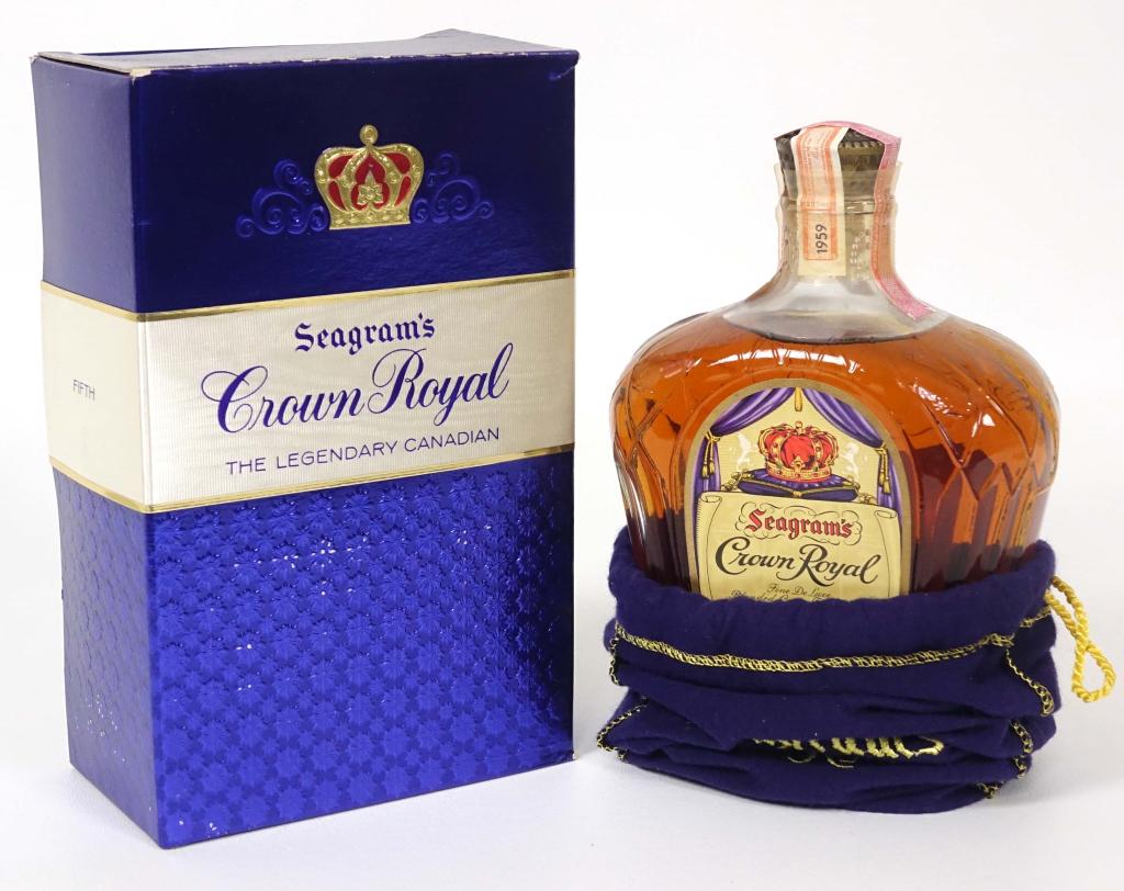 1959 Crown Royal Bottle: ** IF YOU MAY NEED SHIPPING, PLEASE CALL US BEFORE BIDDING ON BOTTLES. 847-625-0555. ** 1959 Crown Royal Bottle: 80 proof, 4/5qt and sealed. In bag. In box.