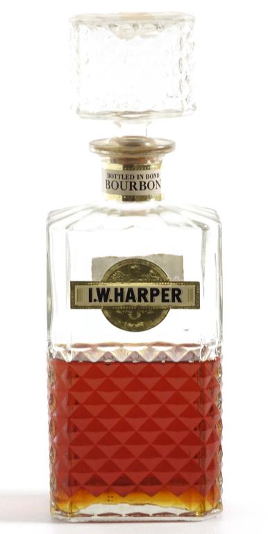 1967 (?) I.W Harper- 1/2 Full*: **IF YOU NEED SHIPPING ON BOTTLES OR DECANTERS PLEASE CALL US BEFORE BIDDING! 847-625-0555!** 100 proof, 4/5 qt and is only **HALF FULL**