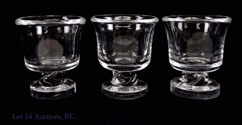 Steuben Crystal Signed Votives (3): 3 crystal votives, all signed "Steuben". Each is 3-1/8" tall and 2-3/4" across the top.