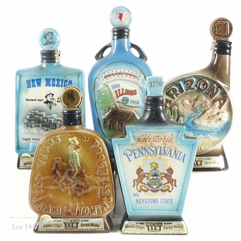 Beam's State Decanters (5): *** IF YOU MAY NEED SHIPPING YOU MUST SPEAK WITH IAN BEFORE BIDDING ON BOTTLES*** 5 Beams Bourbon Whiskey decanters celebrating Arizona, Illinois, New Mexico, Pennsylvania, Wyoming. 86 proof. 4/5 quar