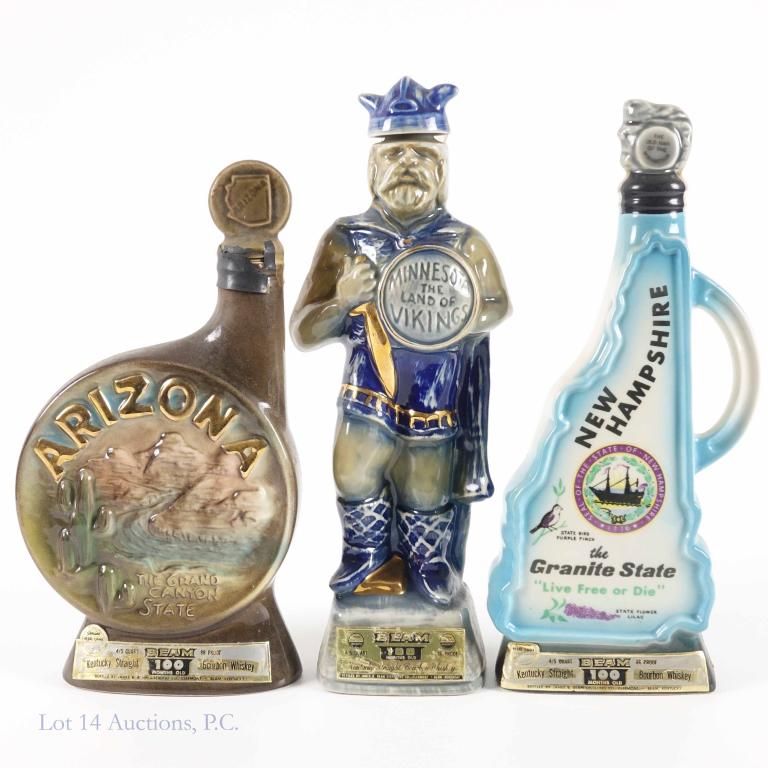 Beam's State Decanters (3): *** IF YOU MAY NEED SHIPPING YOU MUST SPEAK WITH IAN BEFORE BIDDING ON BOTTLES*** 3 Beam's Bourbon Whiskey decanters celebrating Arizona, Minnesota, and New Hampshire. Sealed. 100 months. All feel / s