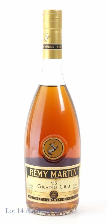 Remy Martin Cognac: IF YOU MAY NEED SHIPPING YOU MUST SPEAK WITH IAN BEFORE BIDDING ON BOTTLES. AOC Petite Champagne, full and sealed. 40%, 750 ml.