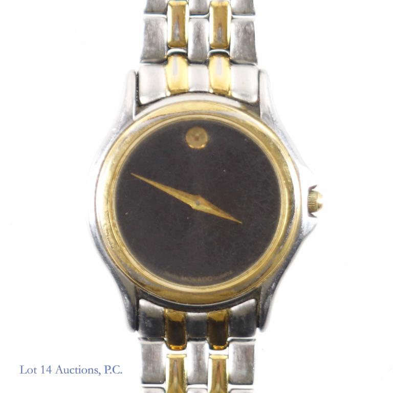 Movado Women's Watch: Back is engraved. 1" diameter face.