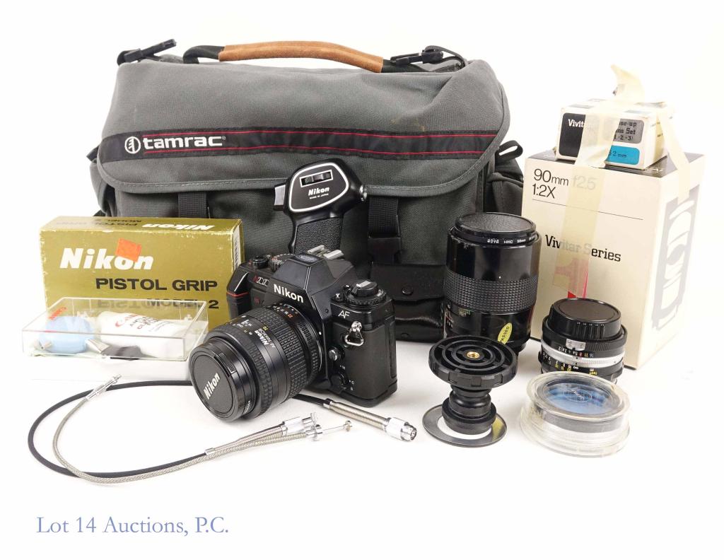 Nikon N2020 35mm Camera * & 3 Lenses: Nikon N2020 35mm SLR Camera (*some corrosion visible in battery compartment). Nikkor AF 35 - 70mm Nikon Lens. Nikkor-H 50mm 1:2 lens. Vivitar 90mm f2.5 lens. Vivitar close-up lens set. Nikon pistol gr