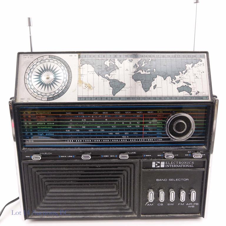 Electronics International Solid State World Radio: Electronics International, model 1829, Solid State World Radio. Made in Hong Kong. Dual Antennae (working and intact), Picks up AM - CB - Short Wave - FM - Air Traffic, Police, and Weather bands. We p