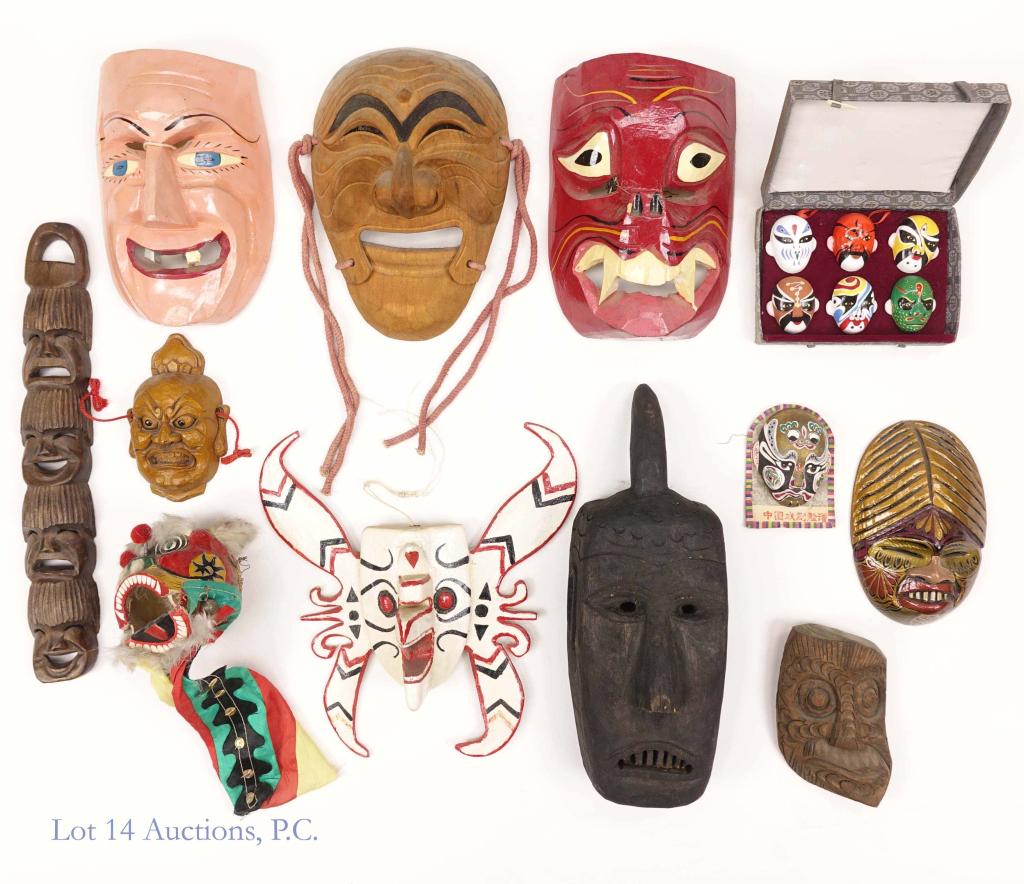 Masks - Asia & Possibly Oceania (17): 17 masks that are from parts of Asia (China, Japan, Indonesia) and possibly from parts of Oceania. Most appear to be hand carved and hand painted woods.