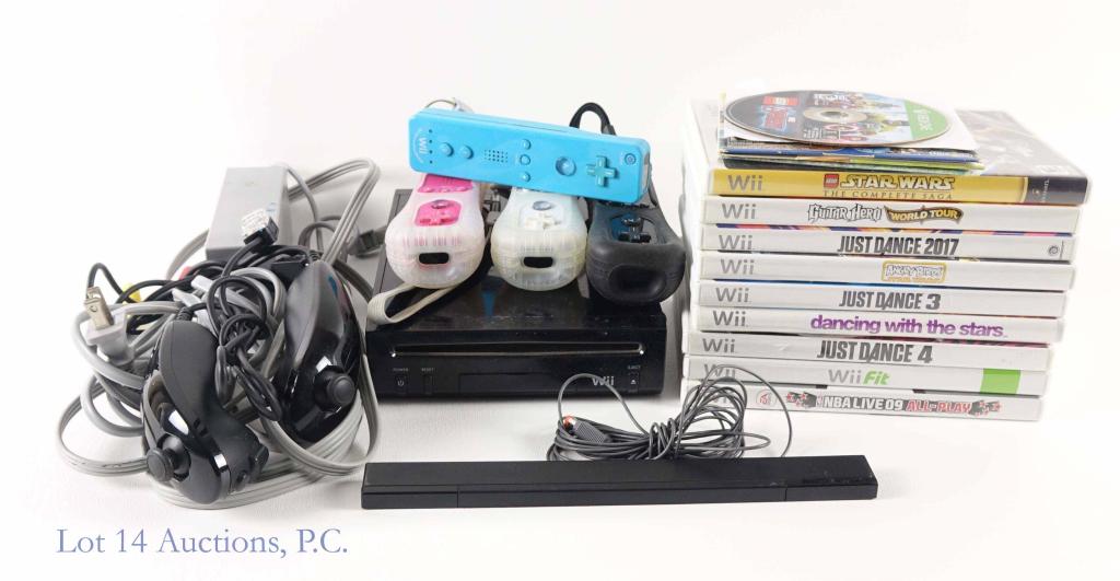 Wii Console and Games: Black Nintendo WII: S/N: KU506845679. Four controllers and three protective controller skins, a pair of joy sticks, power cable, tv cable and WII sensor bar. **Un-tested in house.** Games: NBA Live 09