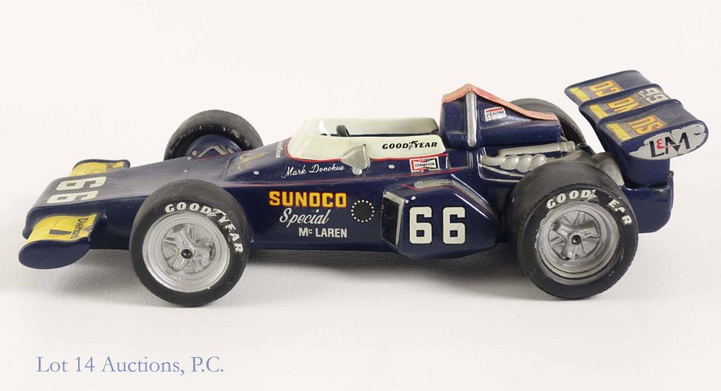 1972 Hoffman Formula 1 Decanter: **IF YOU NEED SHIPPING ON BOTTLES OR DECANTERS PLEASE CALL US BEFORE BIDDING! 847-625-0555!** 1972 Hoffman Distillery bourbon Formula 1 Race Car decanter. Decanter is sealed and sounds full. 10 years.