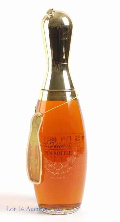 1974 Beam's Bourbon Bowling Pin Decanter: **IF YOU NEED SHIPPING ON BOTTLES OR DECANTERS PLEASE CALL US BEFORE BIDDING! 847-625-0555!** 1974 Beam's bourbon whiskey bowling pin decanter. 8 year. Full and sealed. 86.8 proof. 4/5 quart. Has bowl