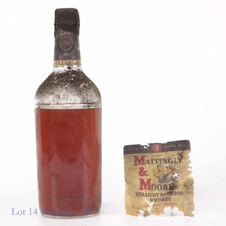 Mattingly & Moore Straight Bourbon Whiskey: **IF YOU NEED SHIPPING ON BOTTLES OR DECANTERS PLEASE CALL US BEFORE BIDDING! 847-625-0555!** Basement pick with vintage dirt. 86 proof, one quart, and sealed. Label is detached, but present. 5 years