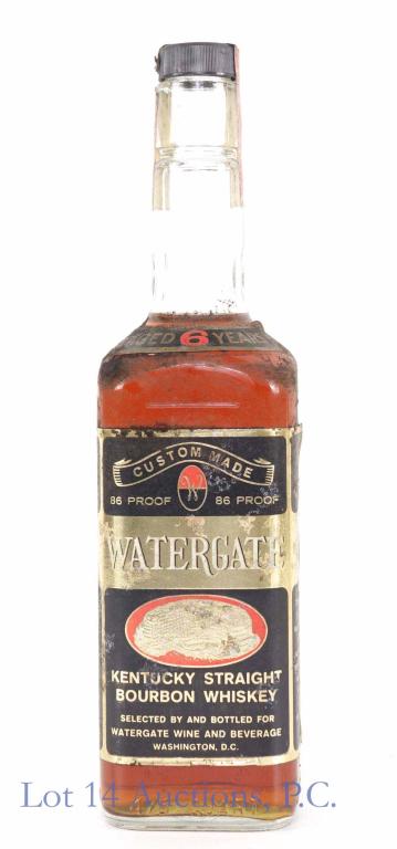 Watergate Hotel Bourbon Whiskey: **IF YOU NEED SHIPPING ON BOTTLES OR DECANTERS PLEASE CALL US BEFORE BIDDING! 847-625-0555!** Basement pick - Kentucky Straight bourbon whiskey made for the Watergate Hotel in Washington DC. 86 proof,