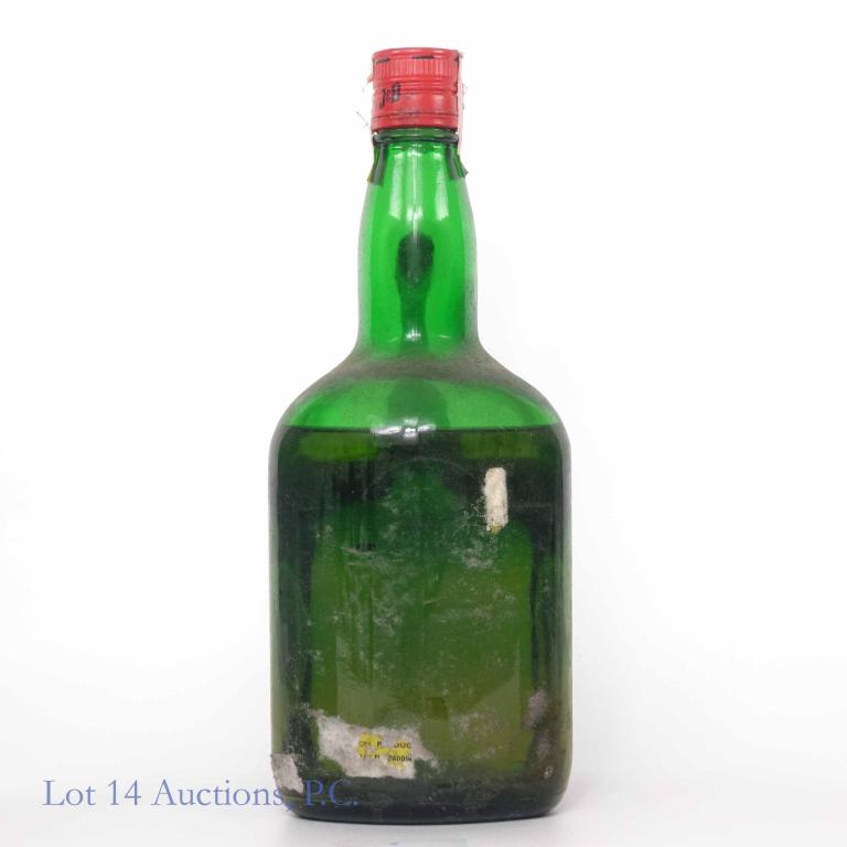 J&B Scotch Whiskey - 1.75 Liter: **IF YOU NEED SHIPPING ON BOTTLES OR DECANTERS PLEASE CALL US BEFORE BIDDING! 847-625-0555!** Label is missing. Based on research: 40% abv, 1.75 L and sealed. Tax strip: 702366746 (?). Lower fill. Cam