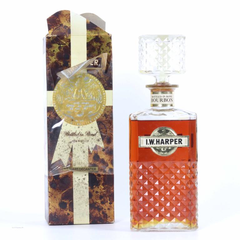 1967 I.W. Harper - BiB: **IF YOU NEED SHIPPING ON BOTTLES OR DECANTERS PLEASE CALL US BEFORE BIDDING! 847-625-0555!** 100 proof, 4/5 qt and sealed. With box. Box is in rough shape.