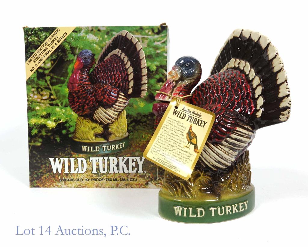 Austin Nichols Wild Turkey Bourbon (Strutting): **IF YOU NEED SHIPPING ON BOTTLES OR DECANTERS PLEASE CALL US BEFORE BIDDING! 847-625-0555!** Austin Nichols Wild Turkey decanter (Strutting turkey). 8 years. Full and sealed. Neck tag and box. 101 pr