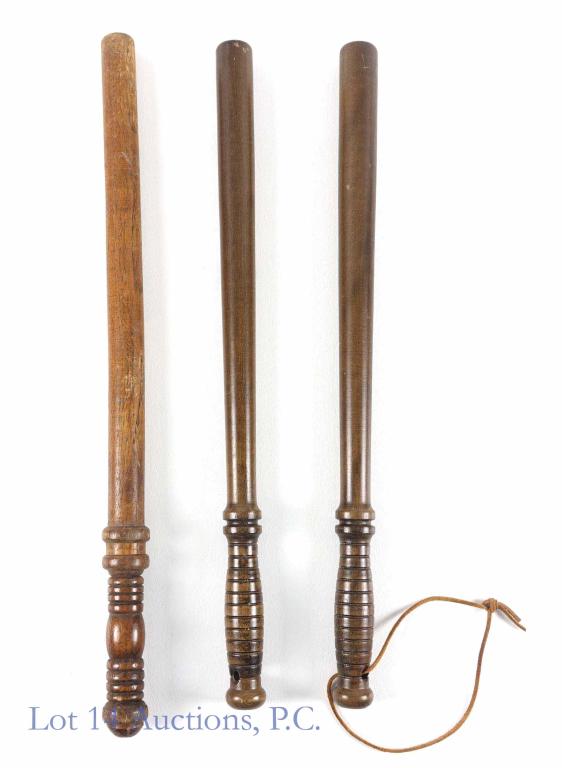 Police Wood Nightsticks / Billy Clubs / Batons (3): Two 22" and one 23" wood clubs. One has leather lanyard. Two of these are likely military, but not marked.