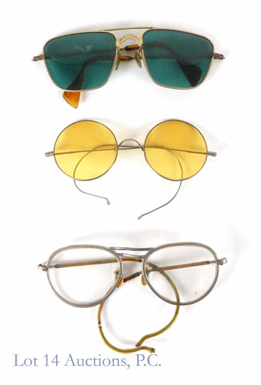 Eyeglasses / Sunglasses - Vintage (1 pr USAAF) (3): 3 pairs of eyeglasses - all appear vintage. The amber colored lenses have the brand "Willson" on the bridge. The pair with clear lenses is also "Willson" brand, but has "USAAF" engraved on the front o