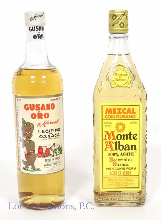 Mezcal & Worms (2): **IF YOU NEED SHIPPING ON BOTTLES OR DECANTERS PLEASE CALL US BEFORE BIDDING! 847-625-0555!** 2 Bottles: Gusano de Oro. 38 proof. 750 ml. Full & sealed. Oaxaca. *** Monte Alban 100% Agave Mezcal con g