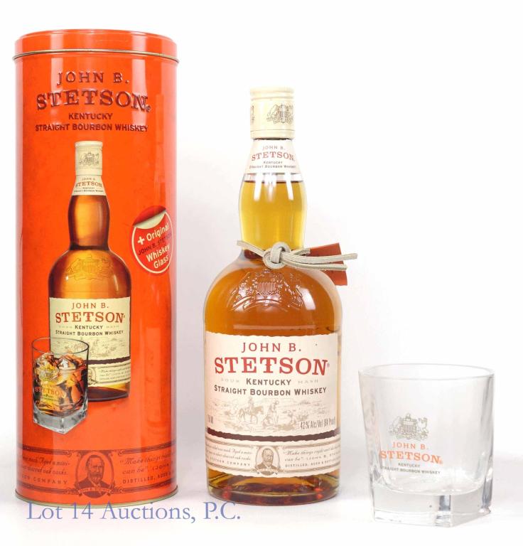 John B. Stetson Bourbon + Glass: **IF YOU NEED SHIPPING ON BOTTLES OR DECANTERS PLEASE CALL US BEFORE BIDDING! 847-625-0555!** John B. Stetson Kentucky straight bourbon whiskey. 84 proof. 750 ml. Full & sealed, in original cannister