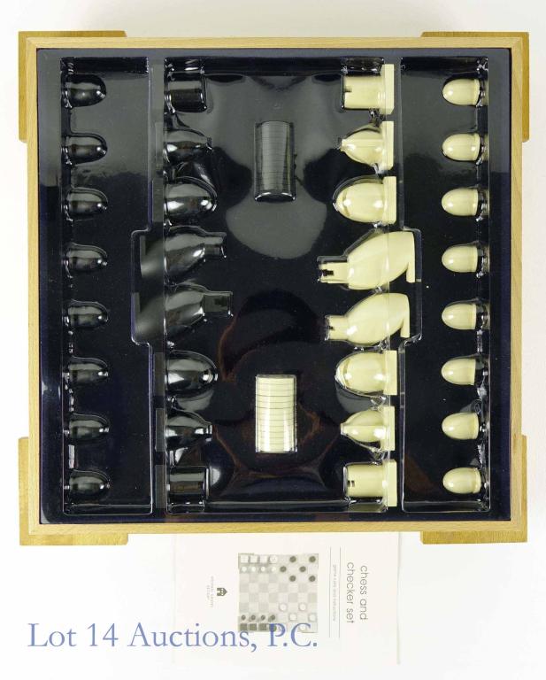 Michael Graves Mid-Century Style Chess Set: Mid-Century style chess set by Michael Graves. Pieces intact and complete with plastic cover. 17 x 17". Board has some scratches and scuffs.