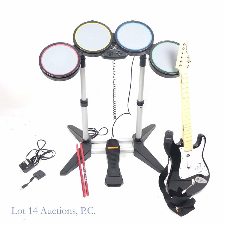 Rock Band Video Game Accessories: Rock Band Video Game Accessories. Includes drum pads, sticks, pedals & guitar. Untested.