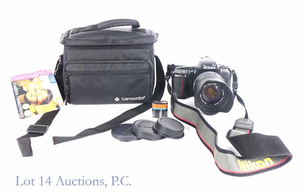 Nikon N6006 35mm Camera: Nikon N6006 35 mm camera. Comes with 28-135 mm sigma zoom lens, Canon mount, Duracell ultra lithium battery, and Samsonite case.