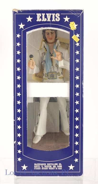 McCormick Elvis Whiskey Decanter: ** IF YOU NEED SHIPPING ON BOTTLES OR DECANTERS PLEASE CALL US BEFORE BIDDING! 847-625-0555! ** McCormick Elvis Presley decanter. c. 1977. 86 proof whiskey. Comes in original box, and is presumed to b