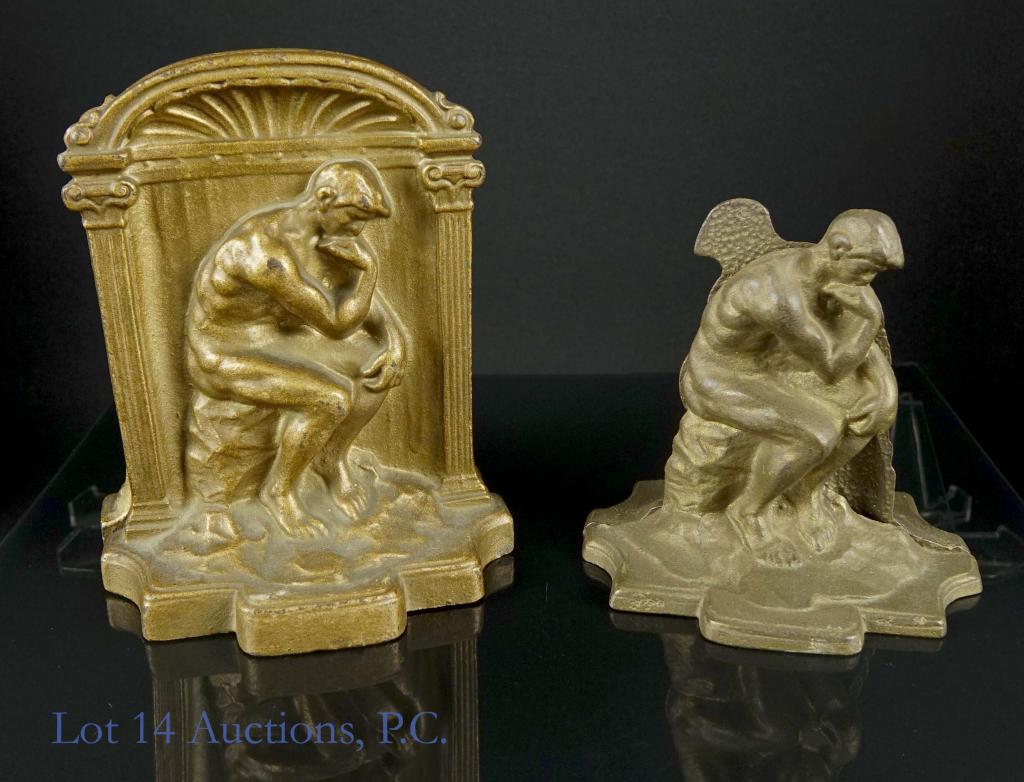 Rodin's "The Thinker" Metal Bookends (2): (2) pairs of metal bookends depicting Auguste Rodin's "The Thinker" or "The Poet" from his "Gates of Hell" sculptural group. The smaller pair is 4-1/4" tall. 1.4 pounds. The larger pair is 5-7/8" tall