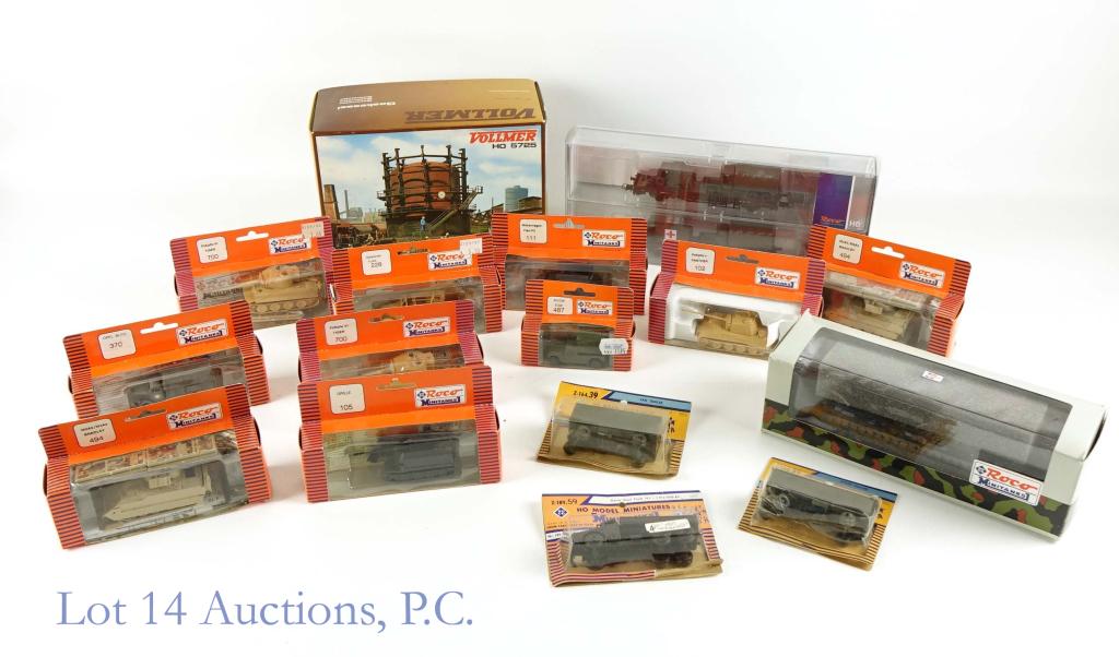 HO Model Railroad Military Accessories (New-Old): Roco HO Minitanks #826 tank carrier car (Special limited edition) *** Roco HO Vehicle carrier cars #66144 - a two pack of carrier cars with 4 vehicles to carry. New-old stock. *** (13) Roco HO militar