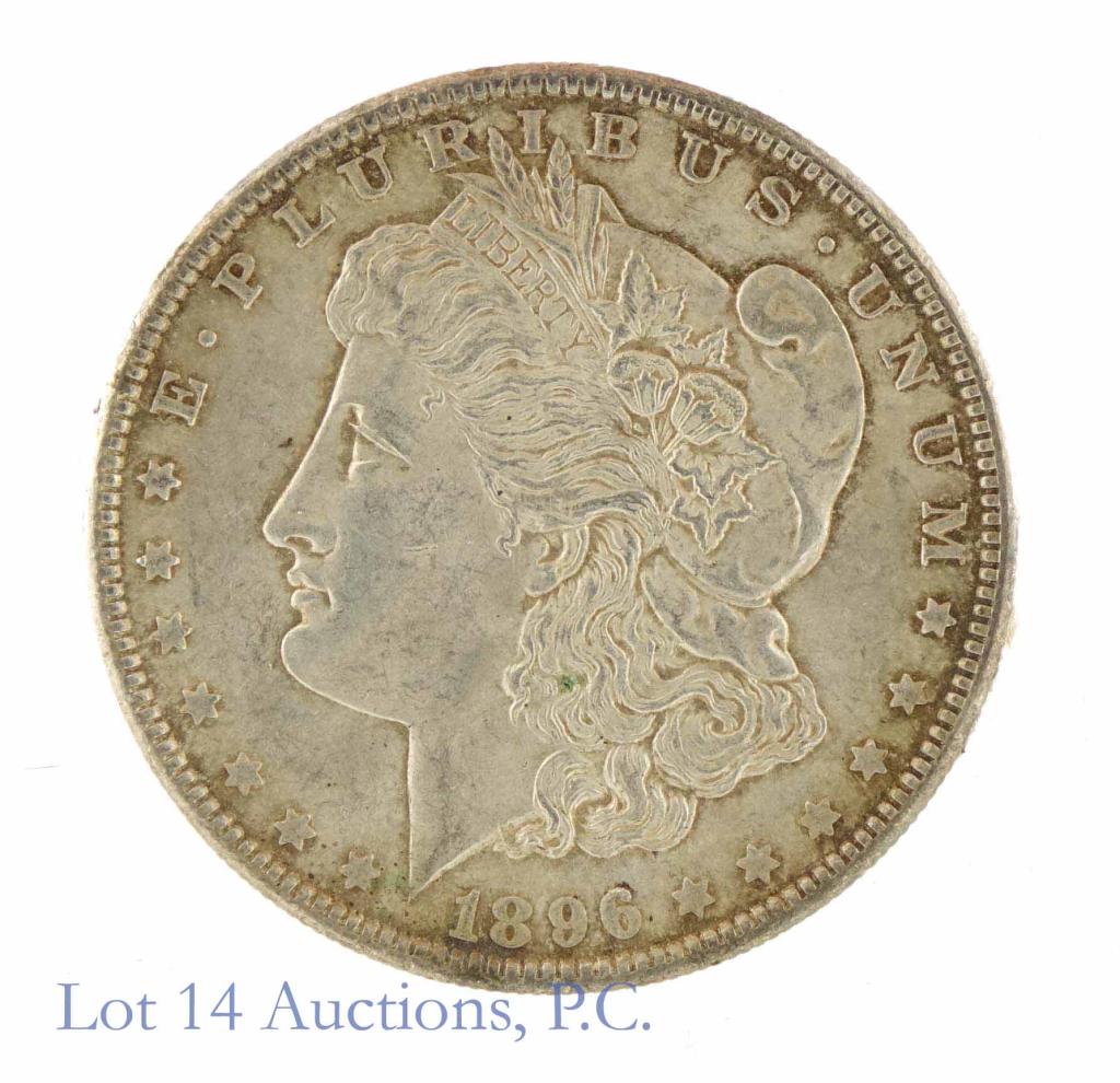 1896 Morgan Silver Dollar (Ch BU?): 1896 Morgan dollar (Philadelphia Mint). 90% silver. Per consigner, choice brilliant uncirculated. *** Please note: we at Lot 14 Auctions are not professional coin graders. We are NOT grading these coi