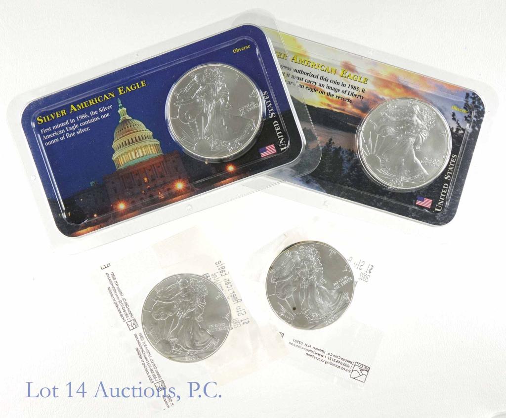 US $1 Silver Eagle Bullion Coins (4): (4) United States $1 Silver Eagle bullion coins: 2000, 2001 (x2), 2002. Each coin is 1 troy ounce of 0.999 fine silver. These particular coins come in plastic wrapping of various kinds from Littleton