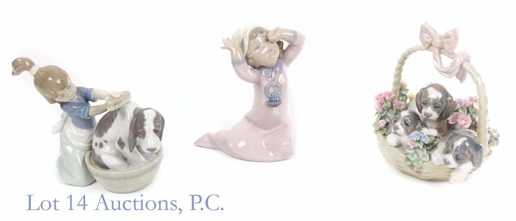 3 Lladro Dogs / Puppies and Children Sculptures: Lladro Litter of Love Basket of Puppies, #1441 (1984?) - Good condition, some minor damage to some of the Capodimonte flower petals (of course). Bashful Bather Dog and Girl, 5455 (1987) sculpture - no