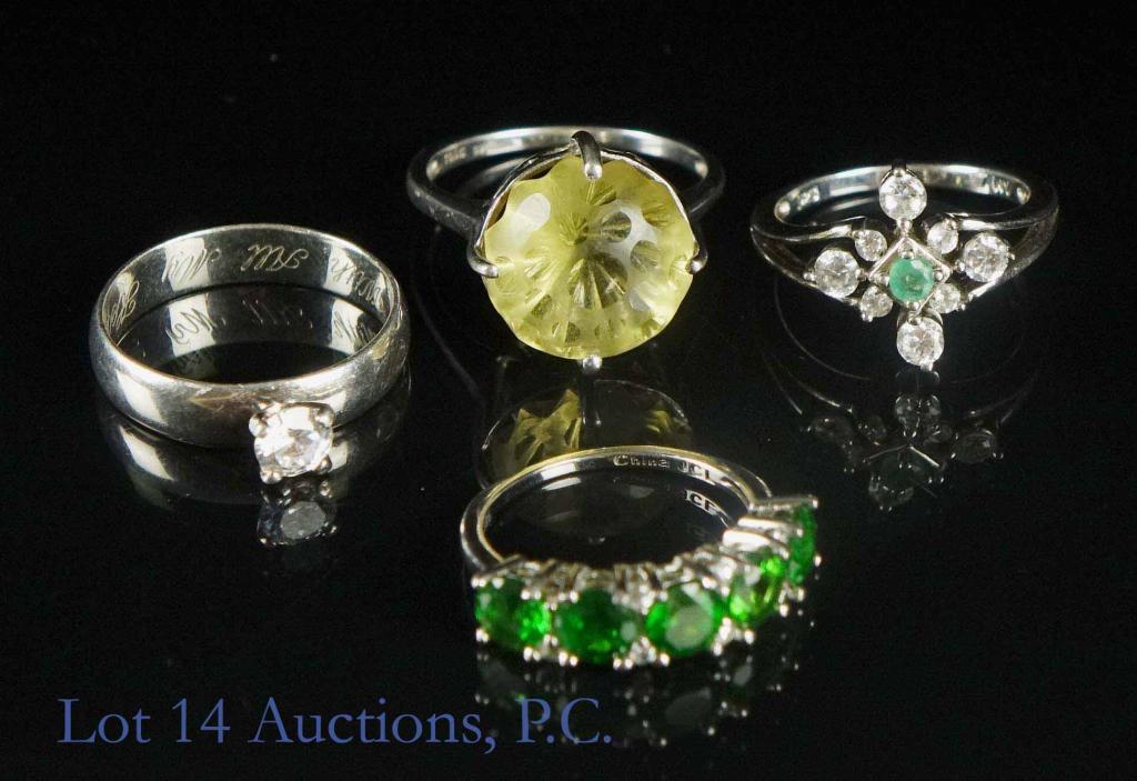 Lot of 4 Sterling Silver Designer Rings: Lot of 4 sterling silver (925 marking) designer rings. 1. Wide band with one stone at center, size 7.75, engraved, "With all my heart". 2. Silver with large yellow Labradorite stone, size 9. 3. Silver