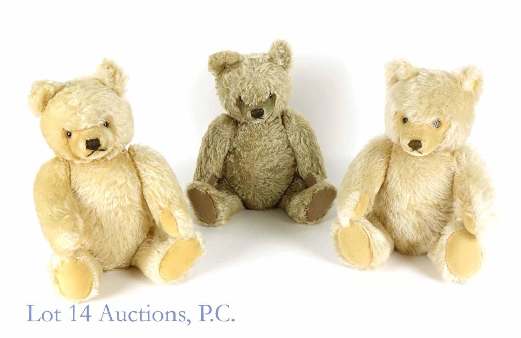 Steiff Bears (3) Two With Buttons: Three Steiff bears. No noticeable stains, dirt or odor. All appear clean and well cared-for. Dark bear has no ear button or tag. One light colored bear has Steif button, and remains of cut tag. Other 