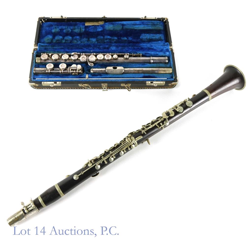 W.T. Armstrong Flute (Model 102) + More: W.T. Armstrong transverse flute (model 102). Action still appears to be good for an older flute. Comes in original case (handle is missing). Cleaning rod included. **** This lot also includes a wooden