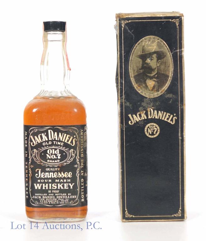 1973 Jack Daniel's Whiskey: *** IF YOU MAY NEED SHIPPING, PLEASE CALL US BEFORE BIDDING ON BOTTLES! 847-625-0555. *** Jack Daniel's Old No. 7 Tennessee sour mash whiskey. 90 proof. 4/5 quart. Sealed with a low neck fill. Series