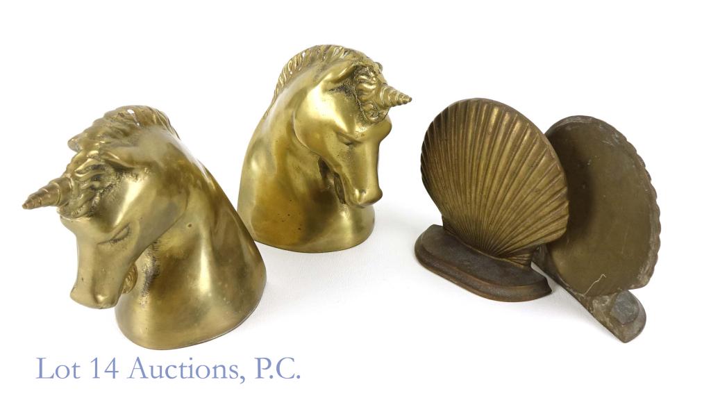 Unicorn & Clam Seashell Brass Bookends: Unicorn brass bookends. 6 x 4 x 3-1/4". Made in Hong Kong. Some wear and staining consistent with age, but overall in great shape! 7 pounds, 12 ounces total weight for the pair. **** Scalloped sea she