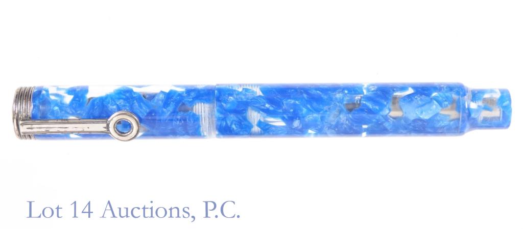 Krone Moderne Blue Cello Pen (18k Nib): Krone Moderne blue cello fountain pen with 18 kt nib. Very clean condition. Body is transparent with blue mixed in.