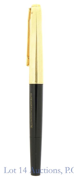 Engraved Pelikan Fountain Pen 14k Gold Nib: W/Poster Pelikan fountain pen with a 14k gold nib. The barrel is engraved "Gutehoffnungshutte" which roughly translates to "good hope" or "best wishes". Some light wear on the barrel and cap. Also inc