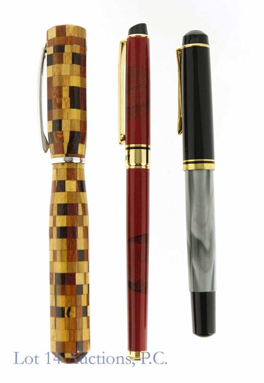 Playboy, Pelikan, Dayacom Fountain Pens: Nice collector lot of three fountain pens. Lets start with a Playboy fountain pen. Clean barrel and cap with the word PLAYBOY written across the gold band. The original nib looks to have never been us