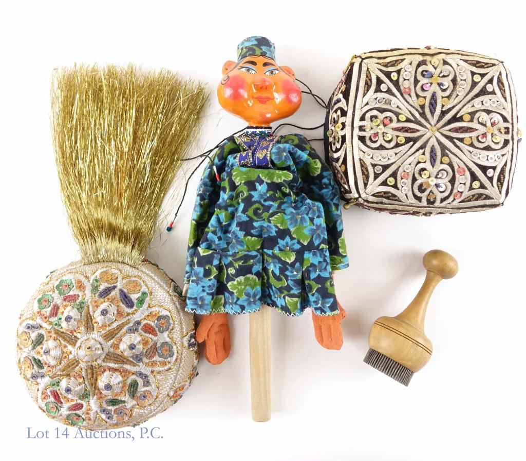Mongolia Decorative Arts Collection: A collection of 2 hats, a hand seal, and a stick puppet from Mongolia. The stick puppet is approximately 14-1/2" tall.