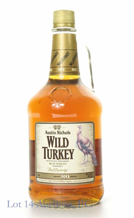 Wild Turkey Bourbon Whiskey 2008 (1.75 L): **IF YOU NEED SHIPPING ON BOTTLES OR DECANTERS PLEASE CALL US BEFORE BIDDING! 847-625-0555!** Wild Turkey Kentucky straight bourbon whiskey. 2008. 80 proof. 1.75 L. Full and sealed, with handle.