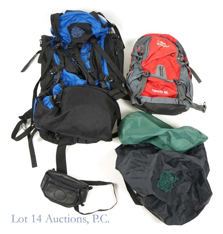 Mountaineering Backpacks (2) + Waist Pack: Lot of 2 mountaineering backpacks and 1 waist pack. 1. Red Cougar Outdoor backpack w/ rain cover. Measures 21" tall. 2. Blue and black Guide Gear backpack w/ rain cover (cover has some washable stains