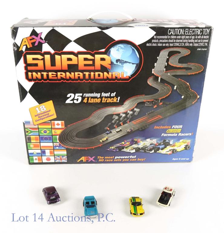 Tomy AFX Super Int'l Track Race Car Set & 8 Cars: Tomy AFX Super International track car set with four original cars and four additional cars (8 total cars). Set includes 25 feet of 4-lane track and 4 Mega G Formula racers. The four additional cars i