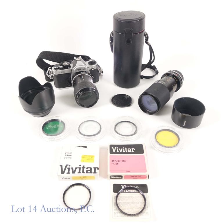 Nikon FM2N 35mm Film Camera & 2 Lenses: Nikon FM2N 35mm film camera (S/N: N7283441) and two lenses: Nikon 36-72mm 1:3.5 zoom lens and Tamron 80-210 1:3.8-4 zoom lens. The Tamron lens has a Pentax mount WITH the Pentax lens to Nikon camera m