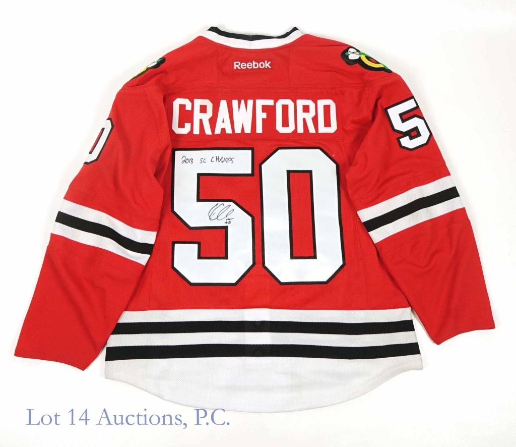 Corey Crawford Signed Blackhawks Jersey: Corey Crawford signed Reebok red #50 Chicago Blackhawks jersey. Size tag is missing. Inscribed 2013 SC Champs. Comes with a Corey Crawford autograph ticket from Sideline Marketing. Comes with Chicago